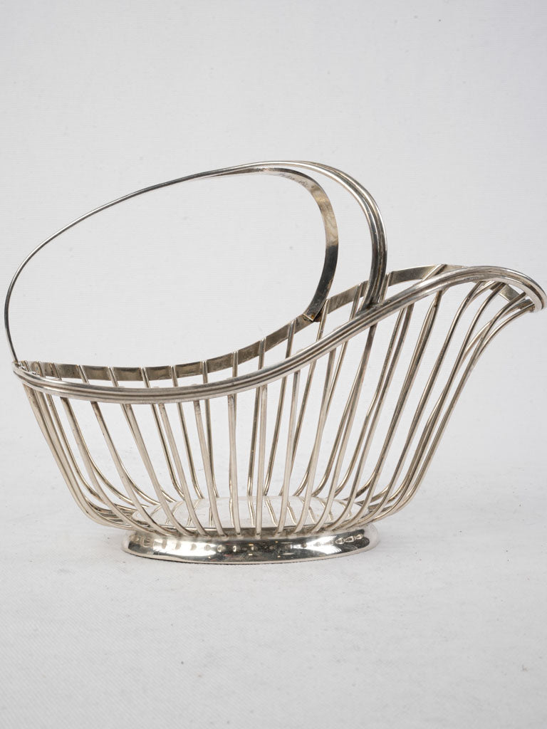Sculptural geometric silver wine cradle