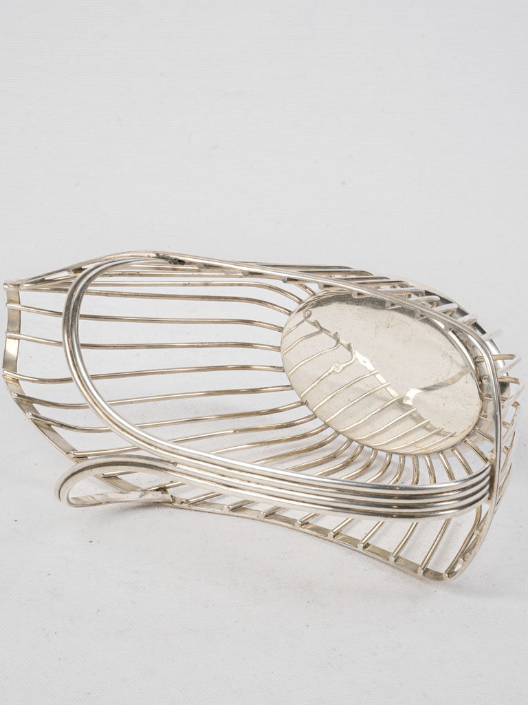 Decorative French silverplate wine cradle