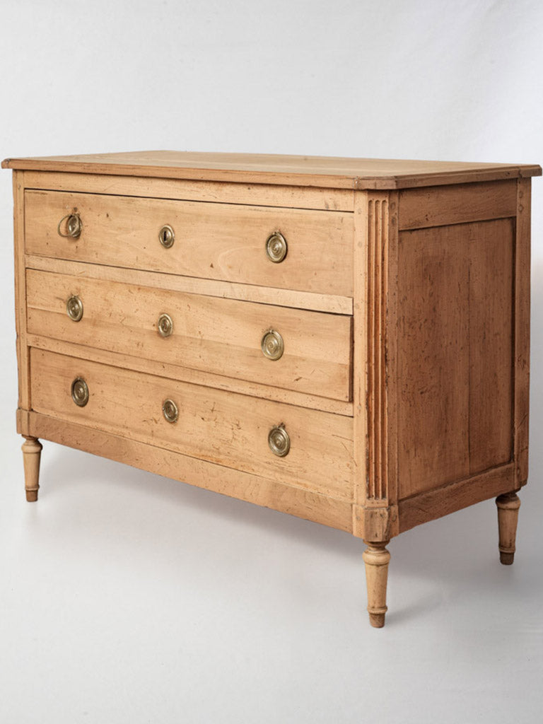 Patinated brass-pull French commode