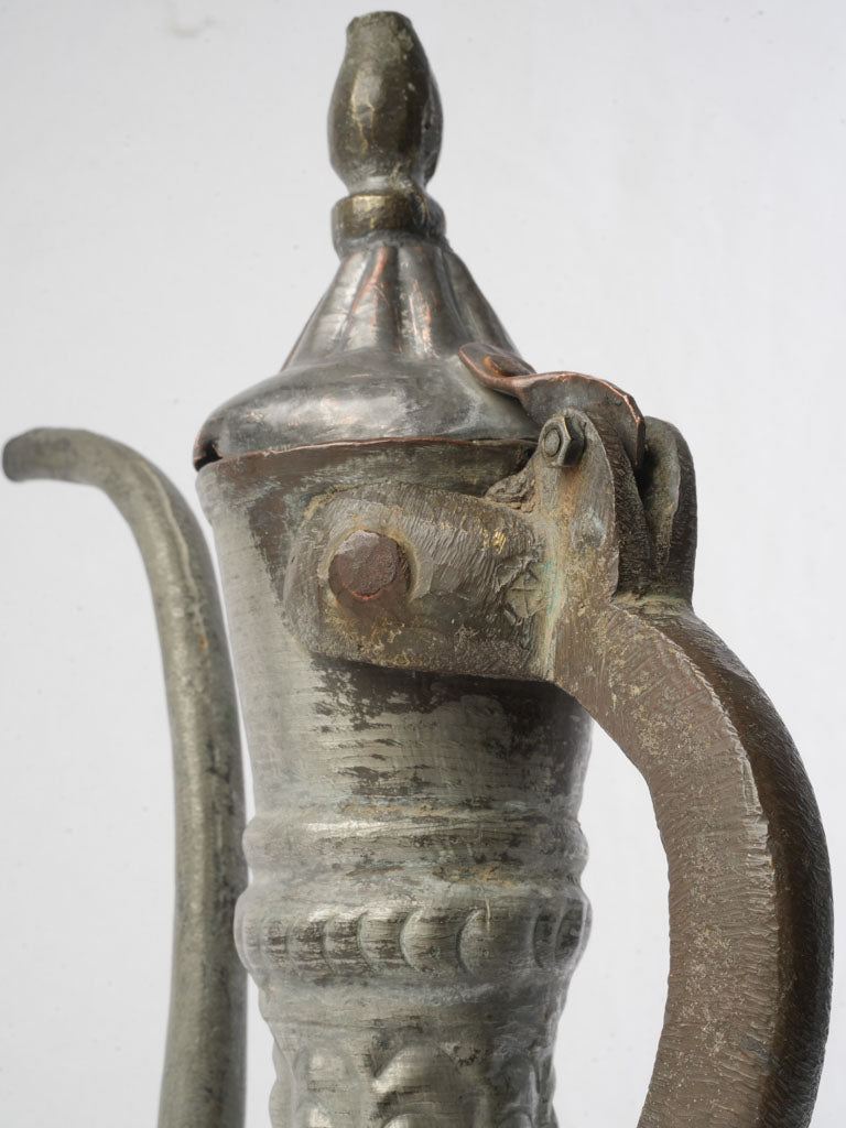 Silvery gray punched rosette ewer