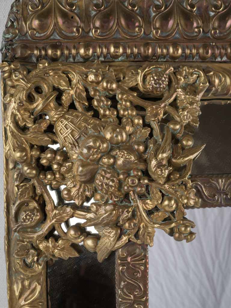 Ornate antique parakeets repoussé mirror