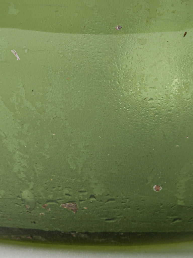 Historic verdant green demijohn jar