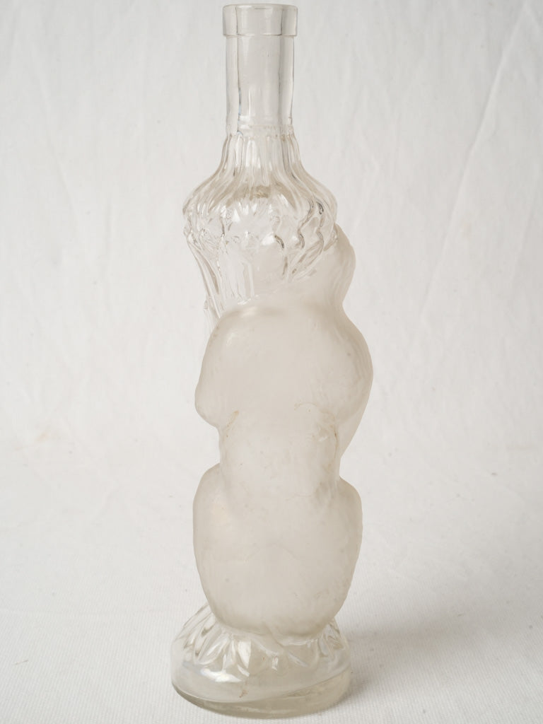 Antique ribbed clear glass bottle