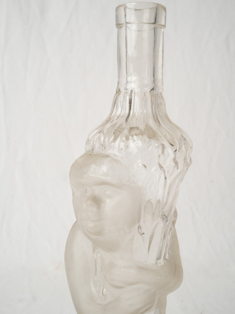 Textured clear glass souvenir bottle