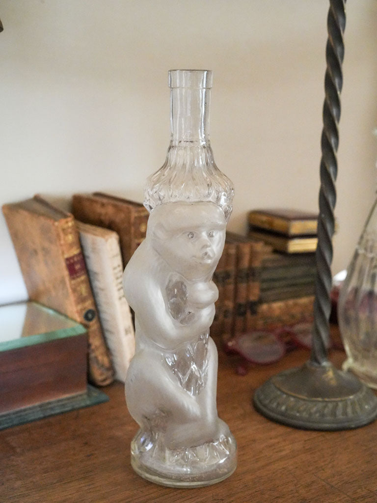 Faceted vintage French glass bottle