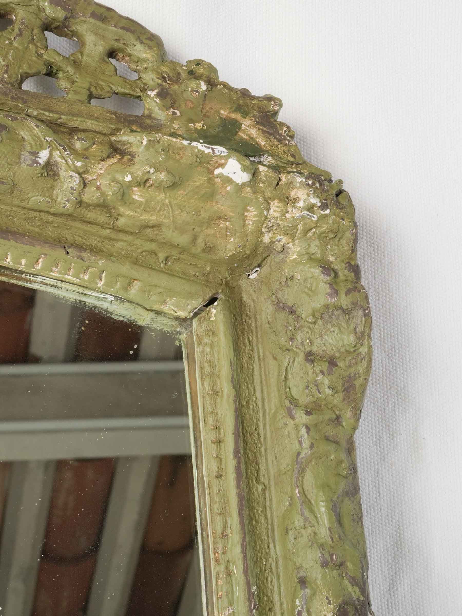 Aged patina rocaille mirror frame.