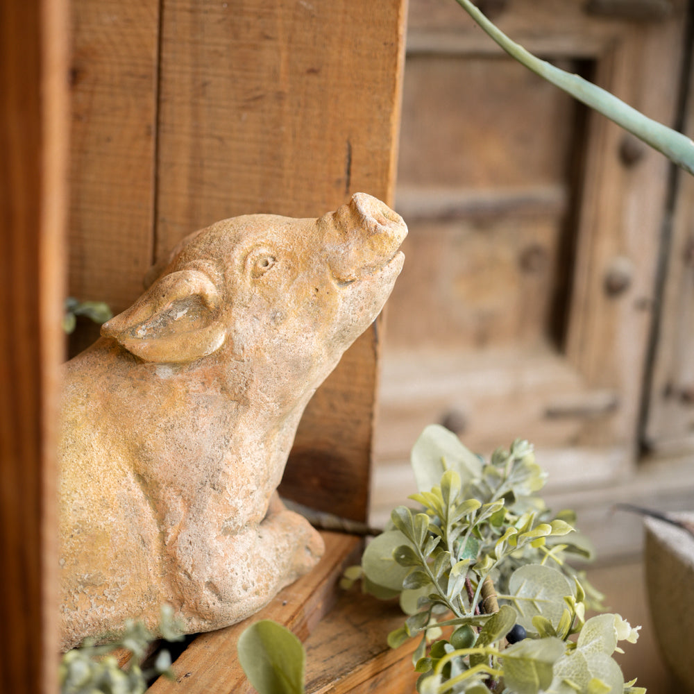 Rustic French garden pig statue