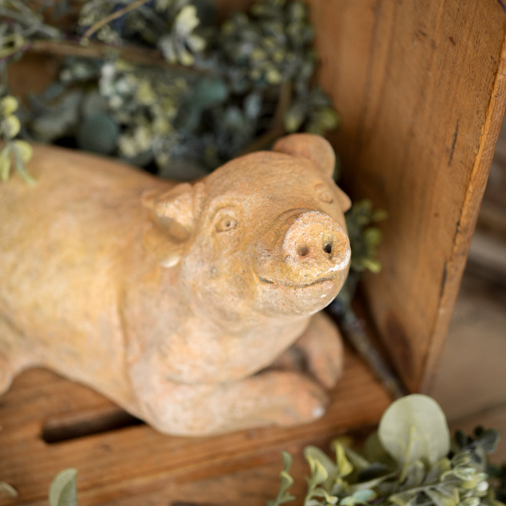 Earthy patina French pig sculpture