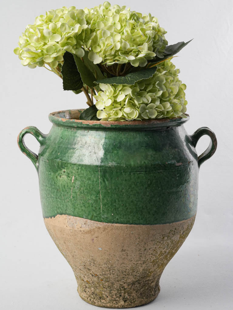 Rustic aged French confit pot