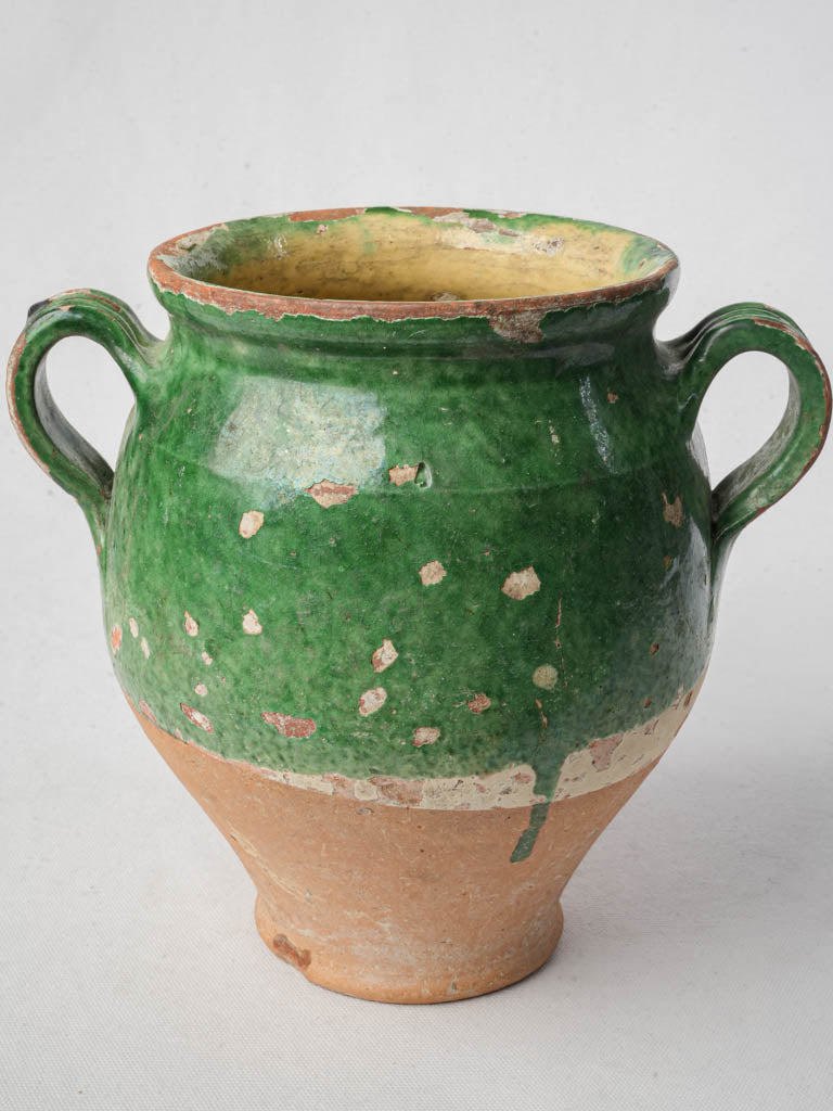Rustic artisanal glazed pottery pot  