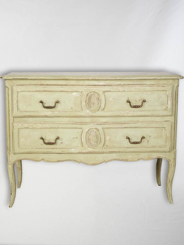 Brass-handled ornate green chest