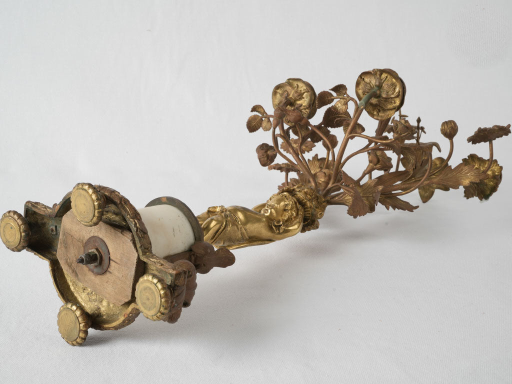 Graceful brass and marble cherub candelabra