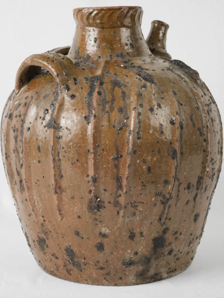 Authentic hand-pressed terracotta oil vessel