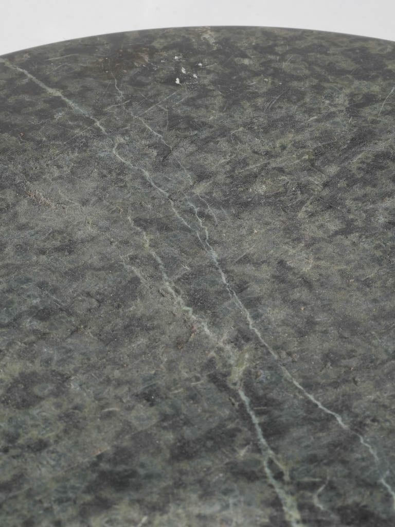 Masterfully carved green pedestal