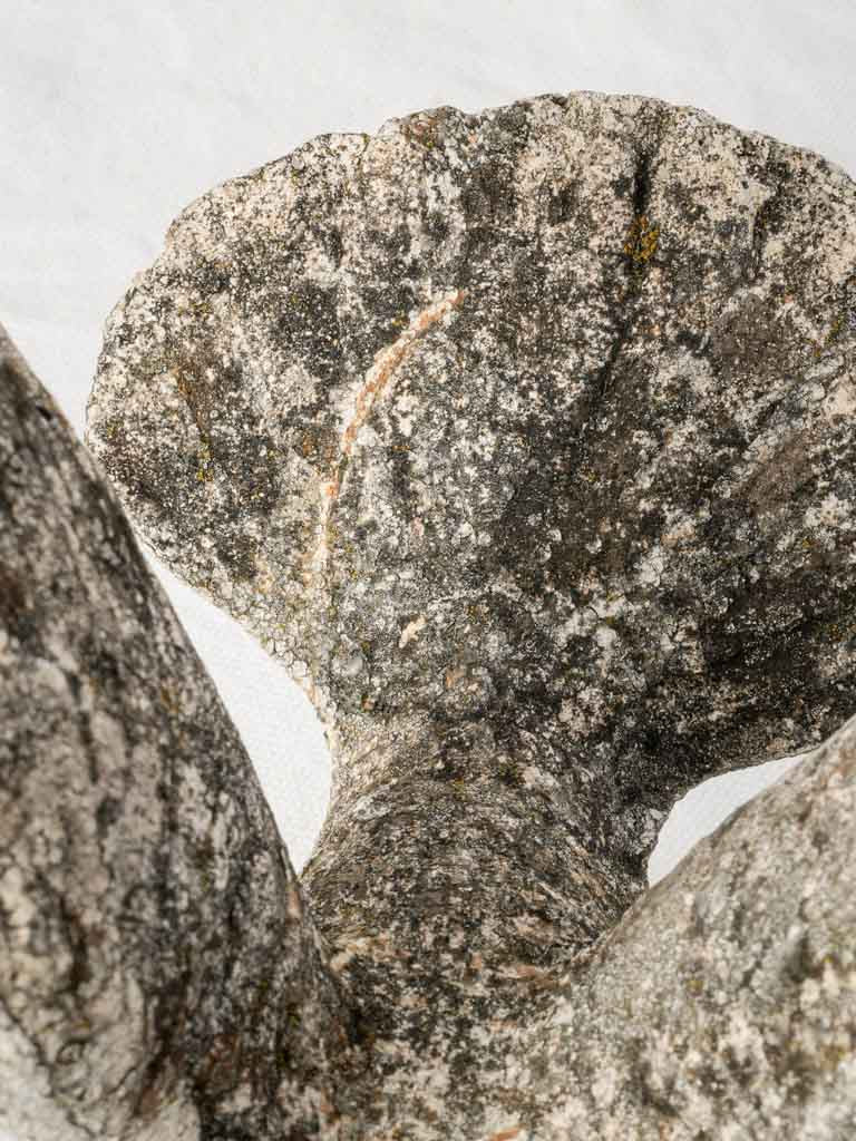 Aged stylized bird figurine