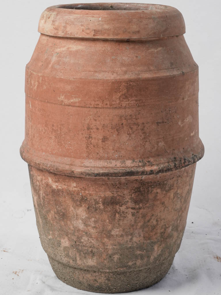 Vintage timeworn terracotta jar