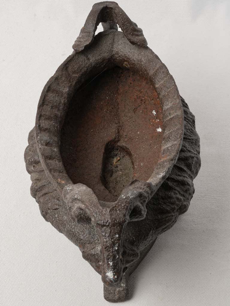 Evocative historical iron jardinière
