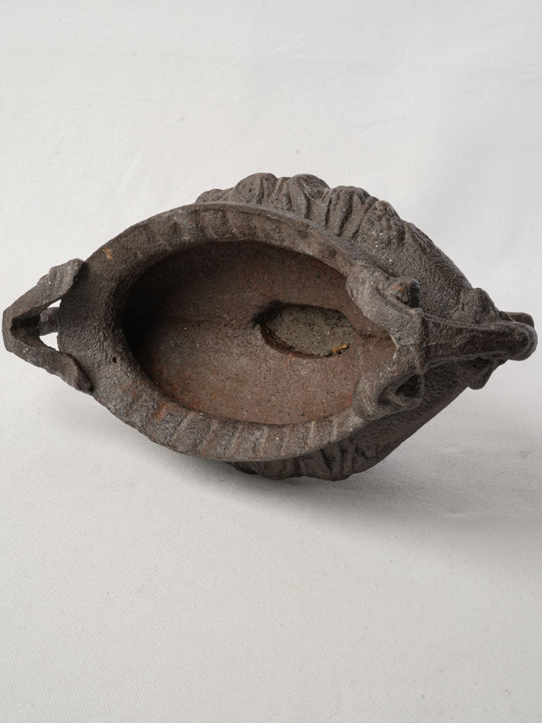 Warm patina cast iron urn  