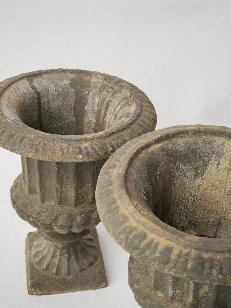 Timeworn elegant cast iron planters