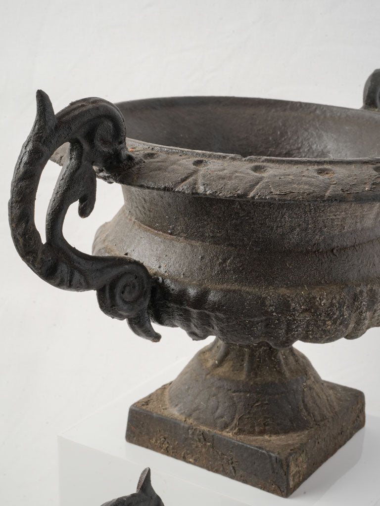 Whimsical antique iron vases  