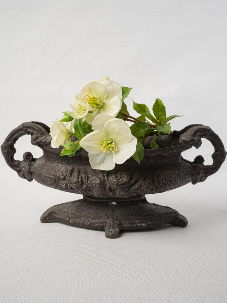 Weathered scroll-handled planter  