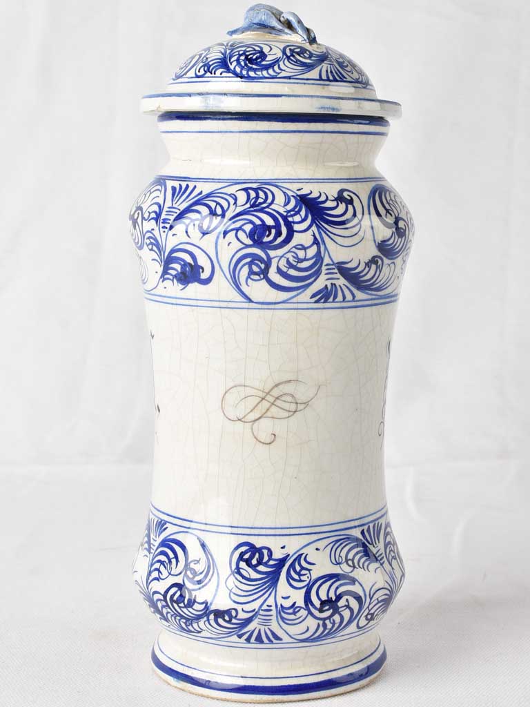 Embossed fern-swirl ceramic jar LN signed