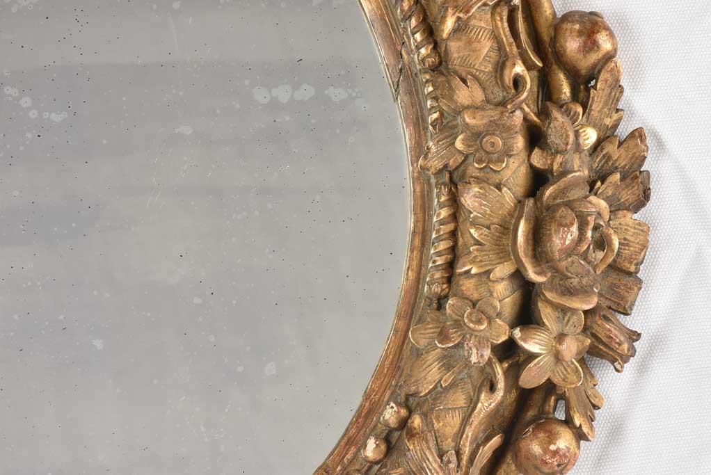 Lovely aged Louis XVI oval mirror
