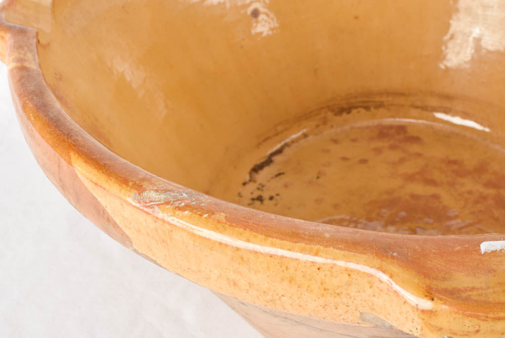 Large antique French bowl with yellow ochre glaze 19"