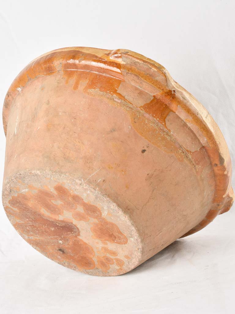 Large antique French bowl with yellow ochre glaze 19"