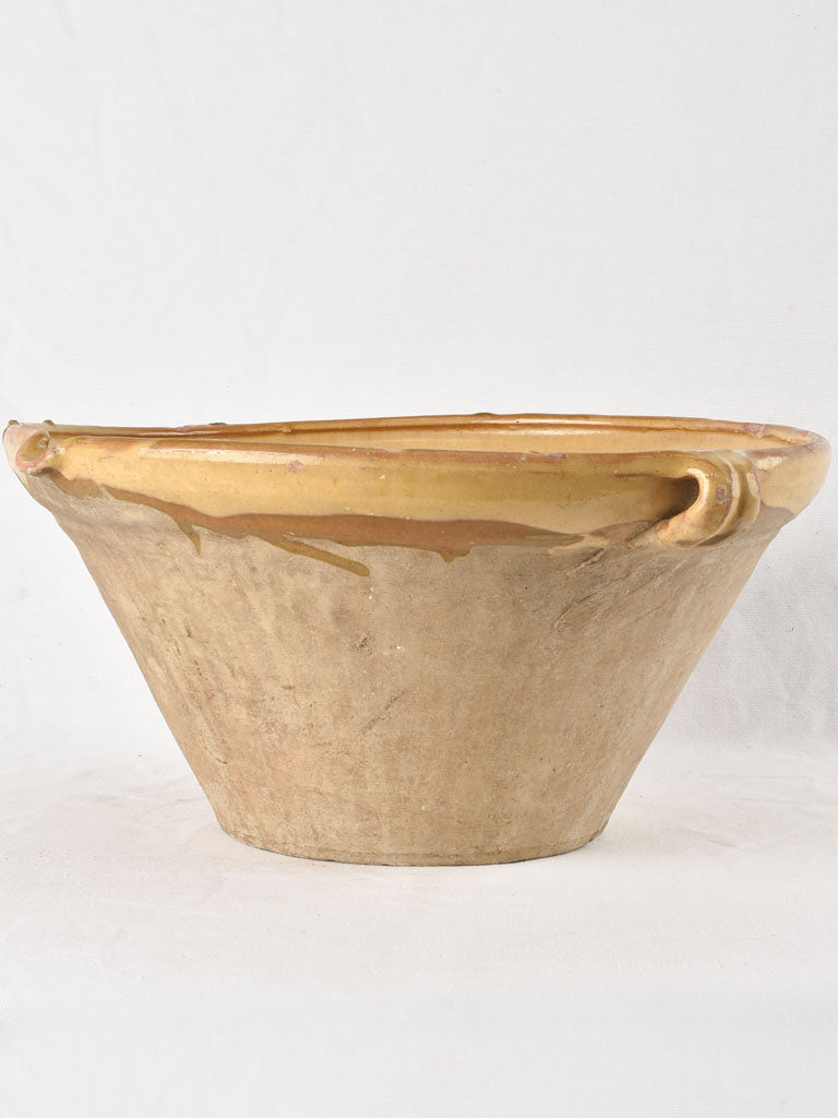 Large antique French bowl with ochre glaze 18"