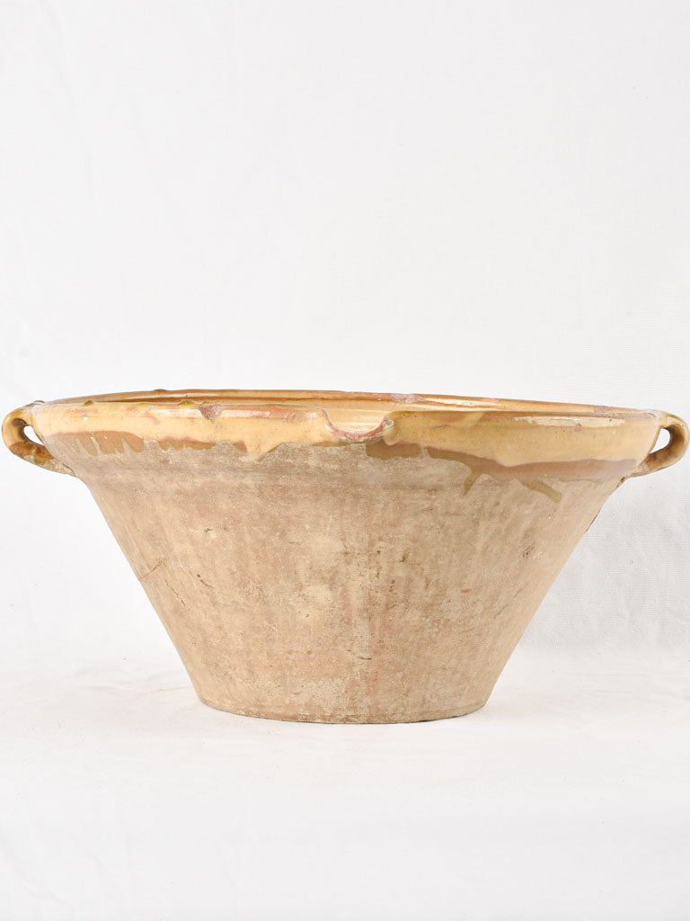 Large antique French bowl with ochre glaze 18"
