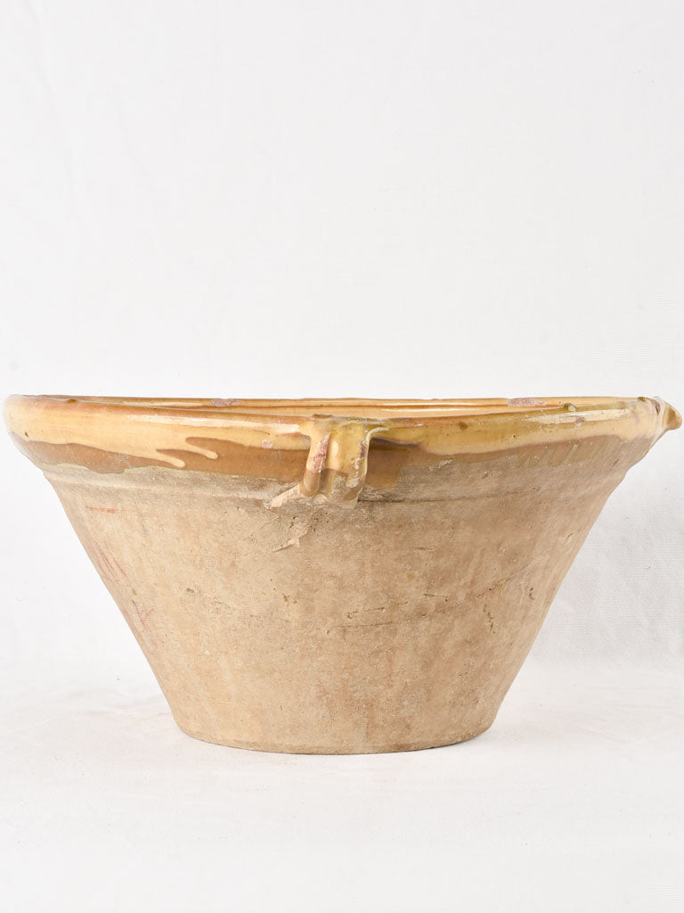 Large antique French bowl with ochre glaze 18"