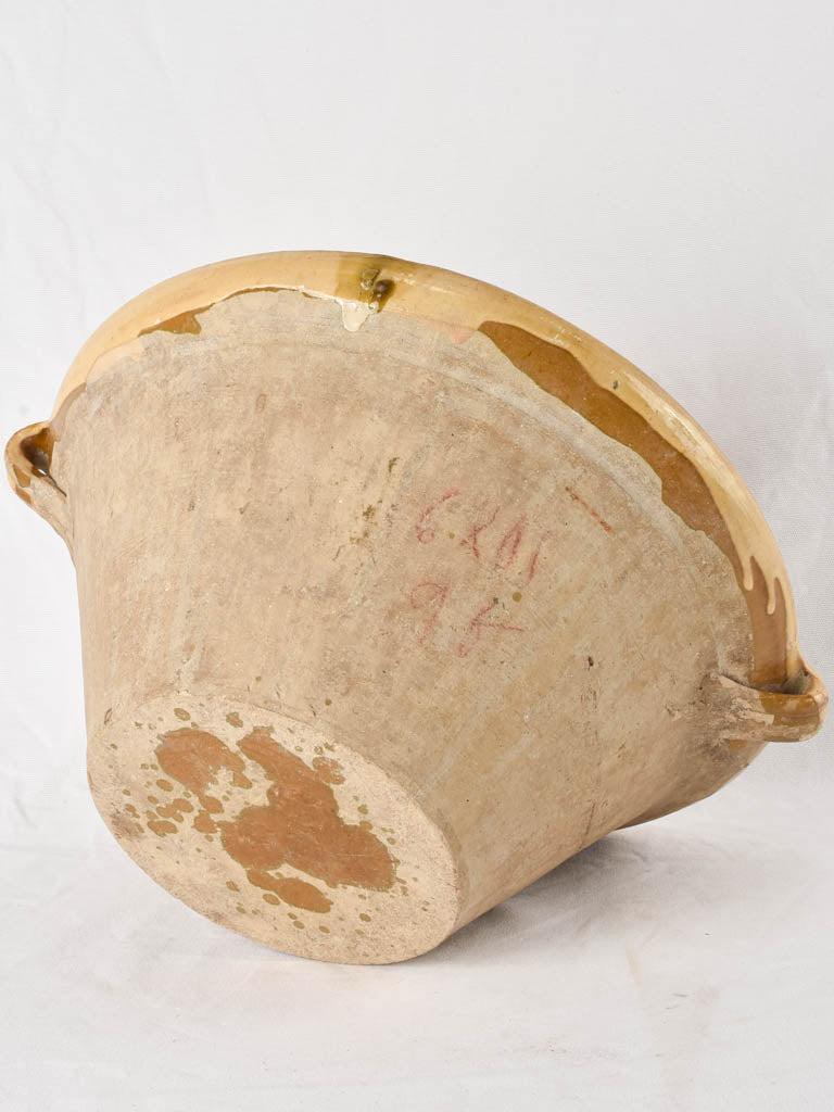 Large antique French bowl with ochre glaze 18"