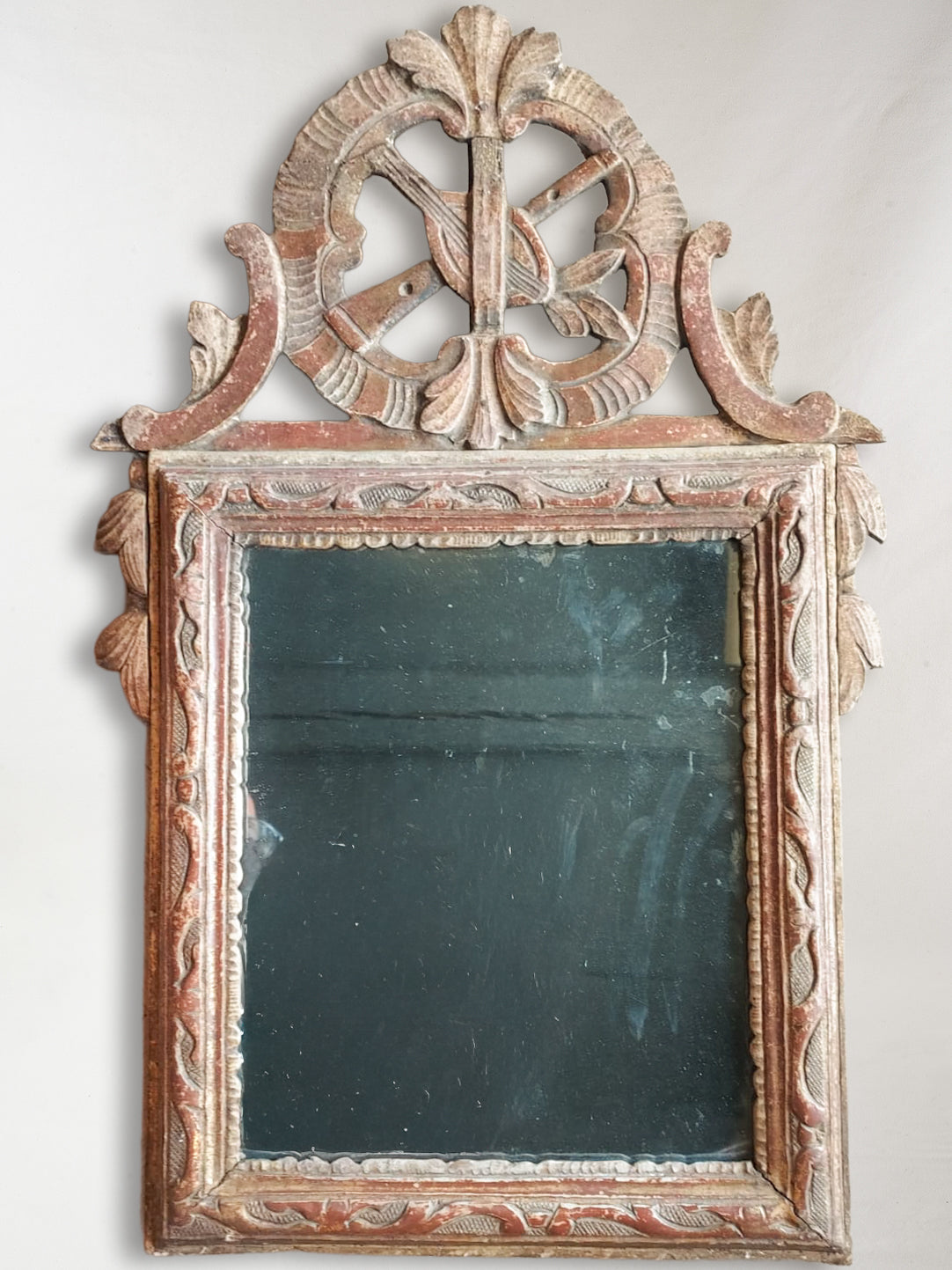Antique ornate carved mirror