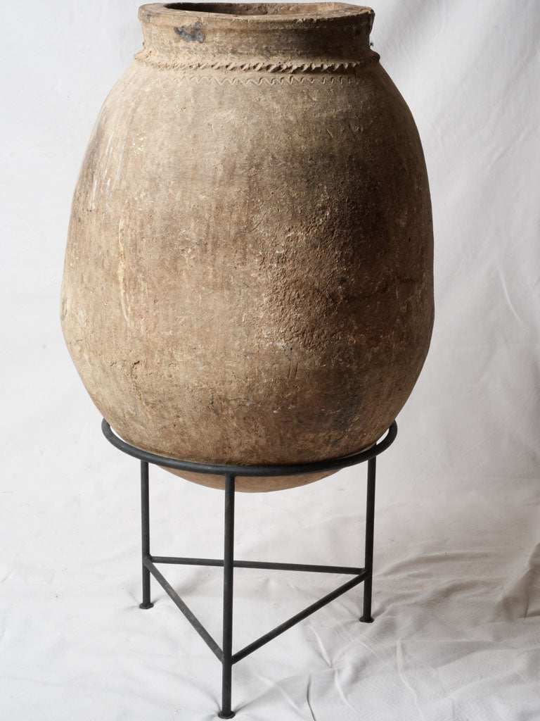 Weathered artisanal pottery stand piece