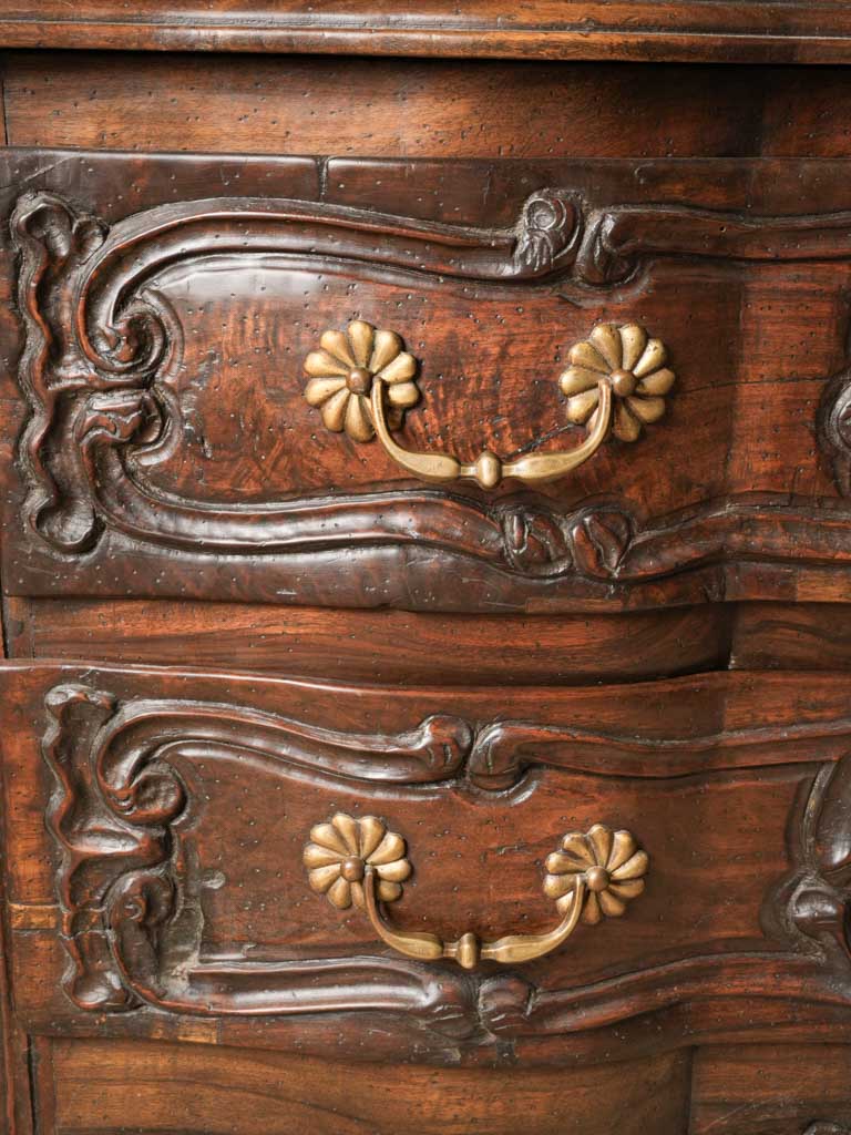 Elegant walnut serpentine commode