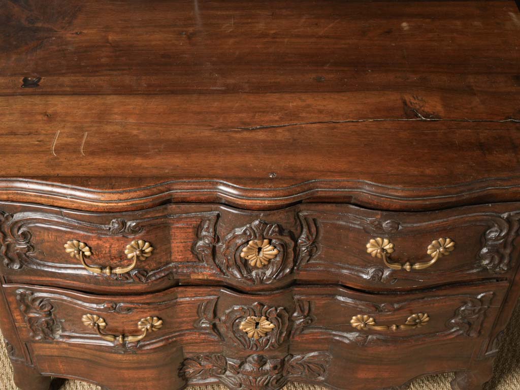 Antique French serpentine commode