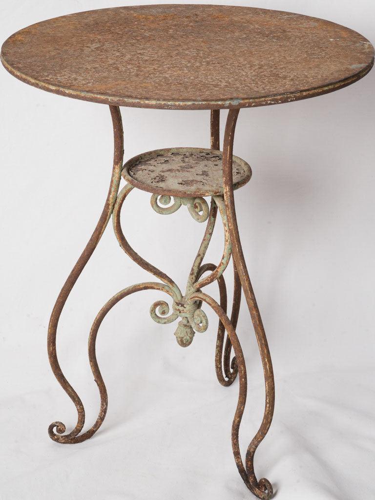 Textured patina gueridon accent table  