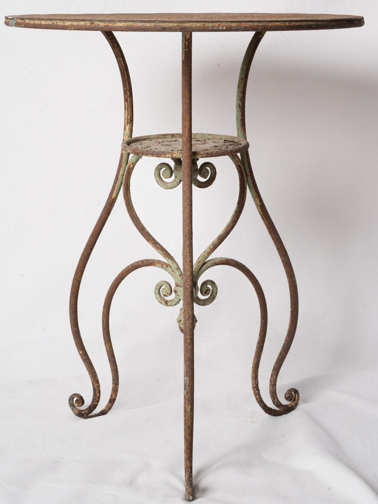 Weathered decorative iron garden table  