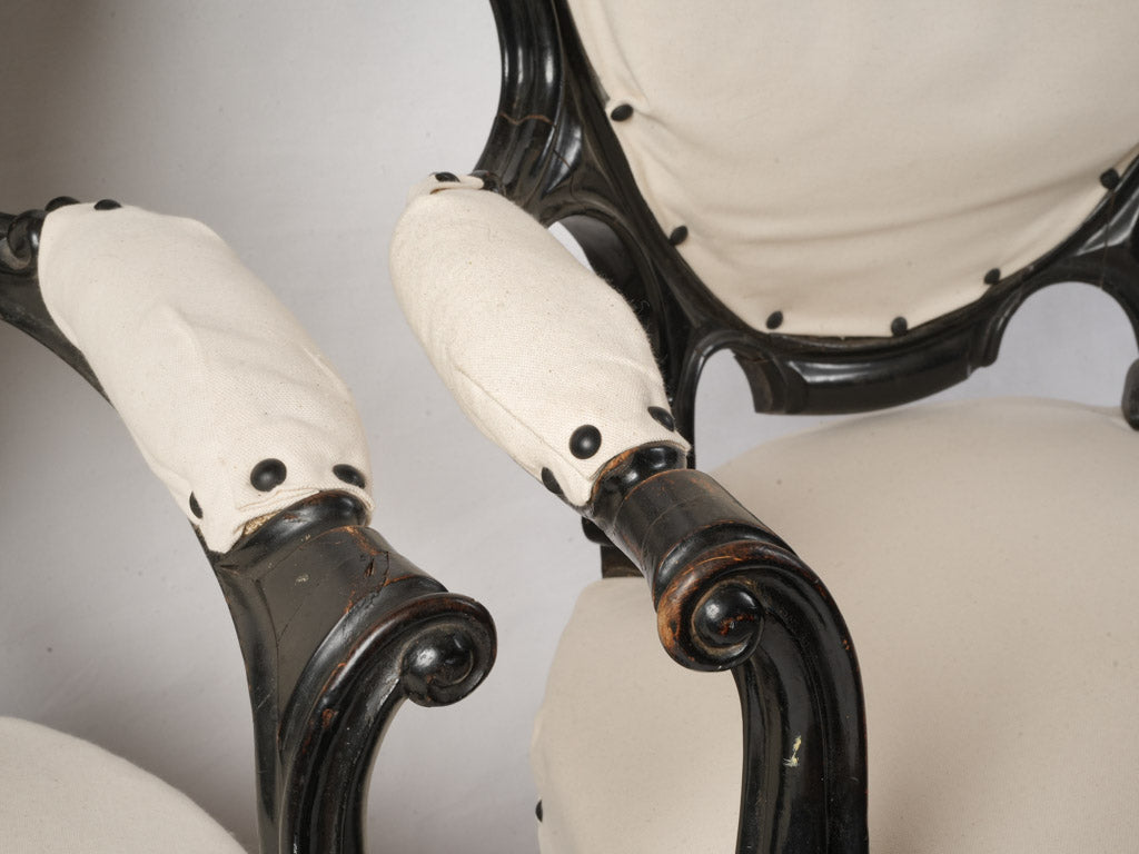 Distinctive oval back armchairs