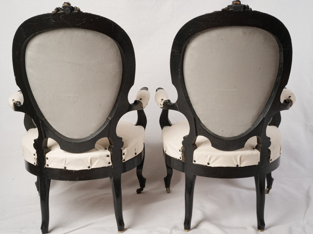 Antique carved floral crest chairs