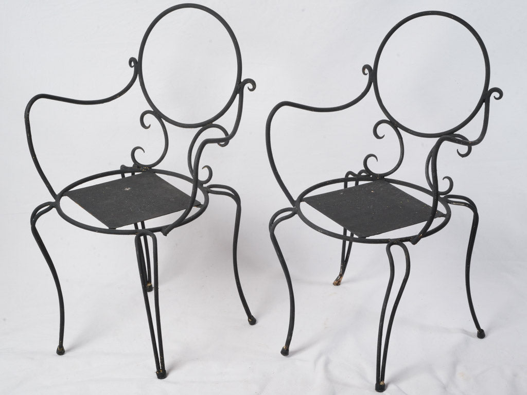 Vintage airy sculptural garden chairs