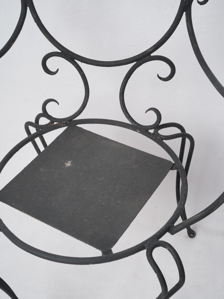 Sculptural airy wrought iron seats