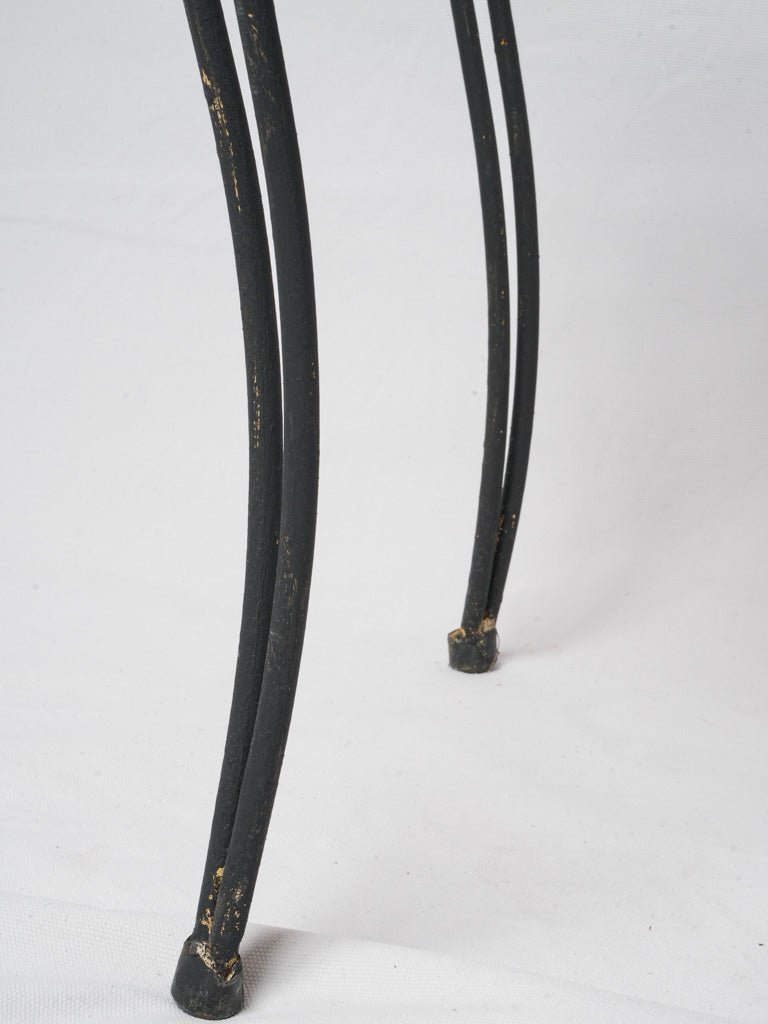 Light versatile scrollwork café chairs