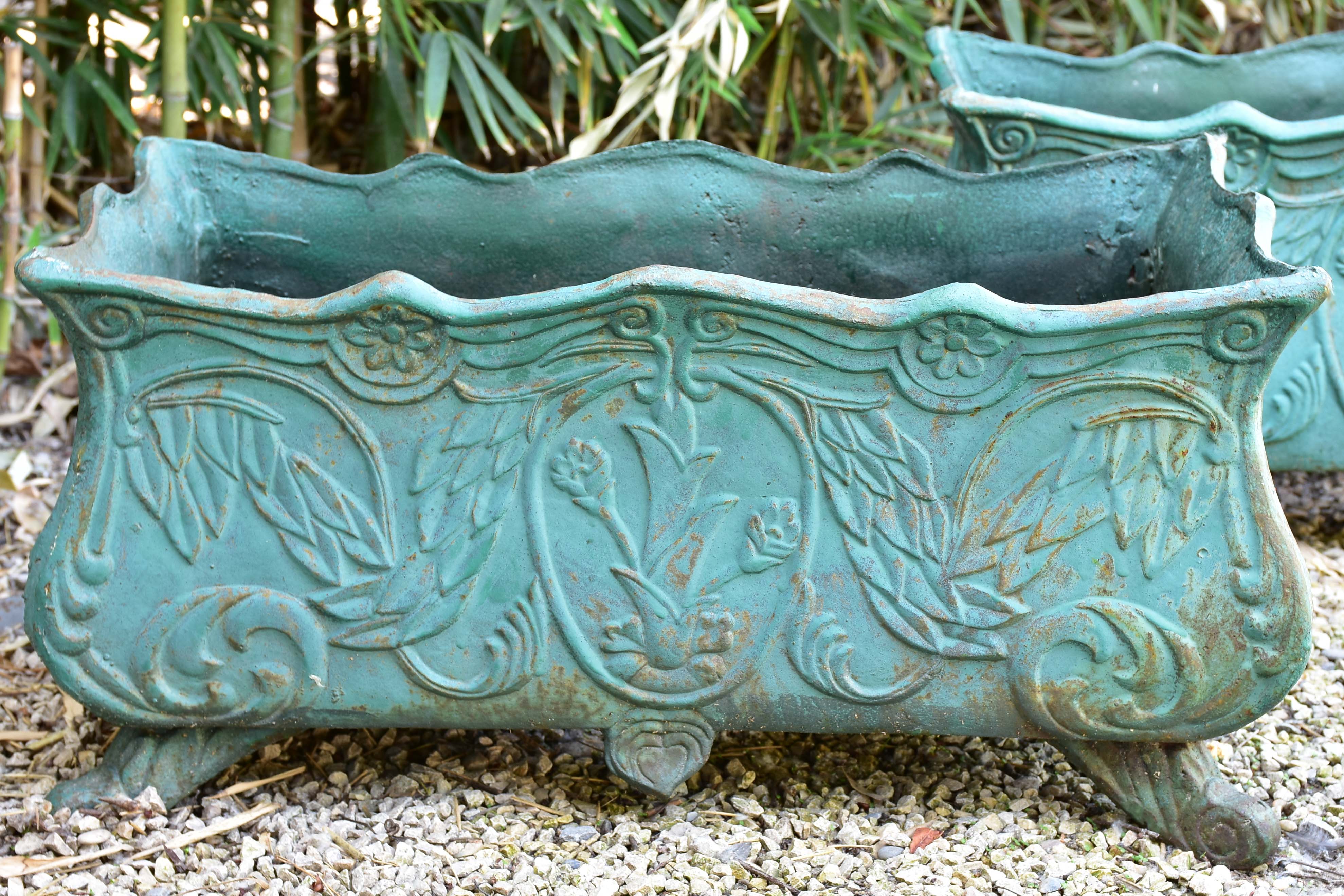 Two antique cast iron French garden planters with green finish