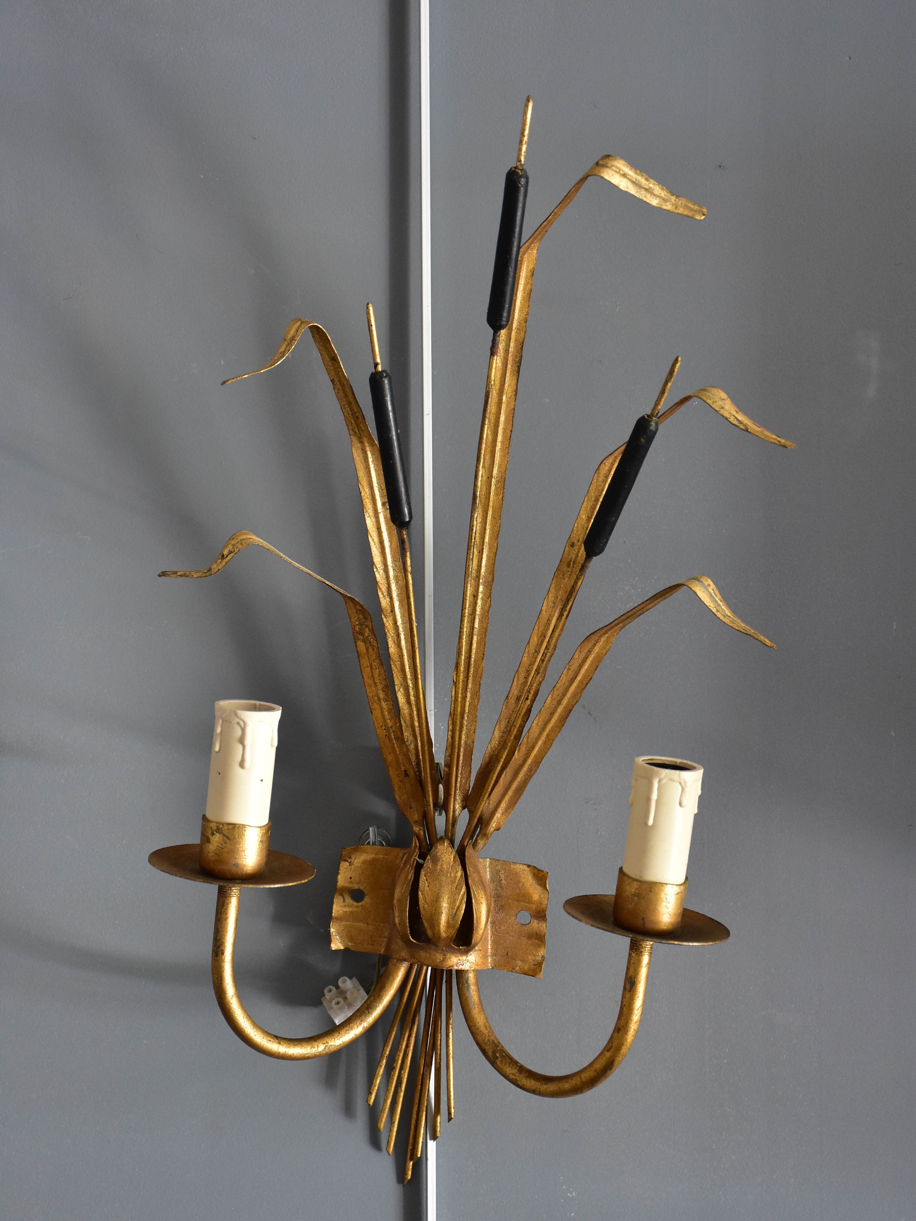 Pair of bull rush wall appliques in the style of Maison Jansen