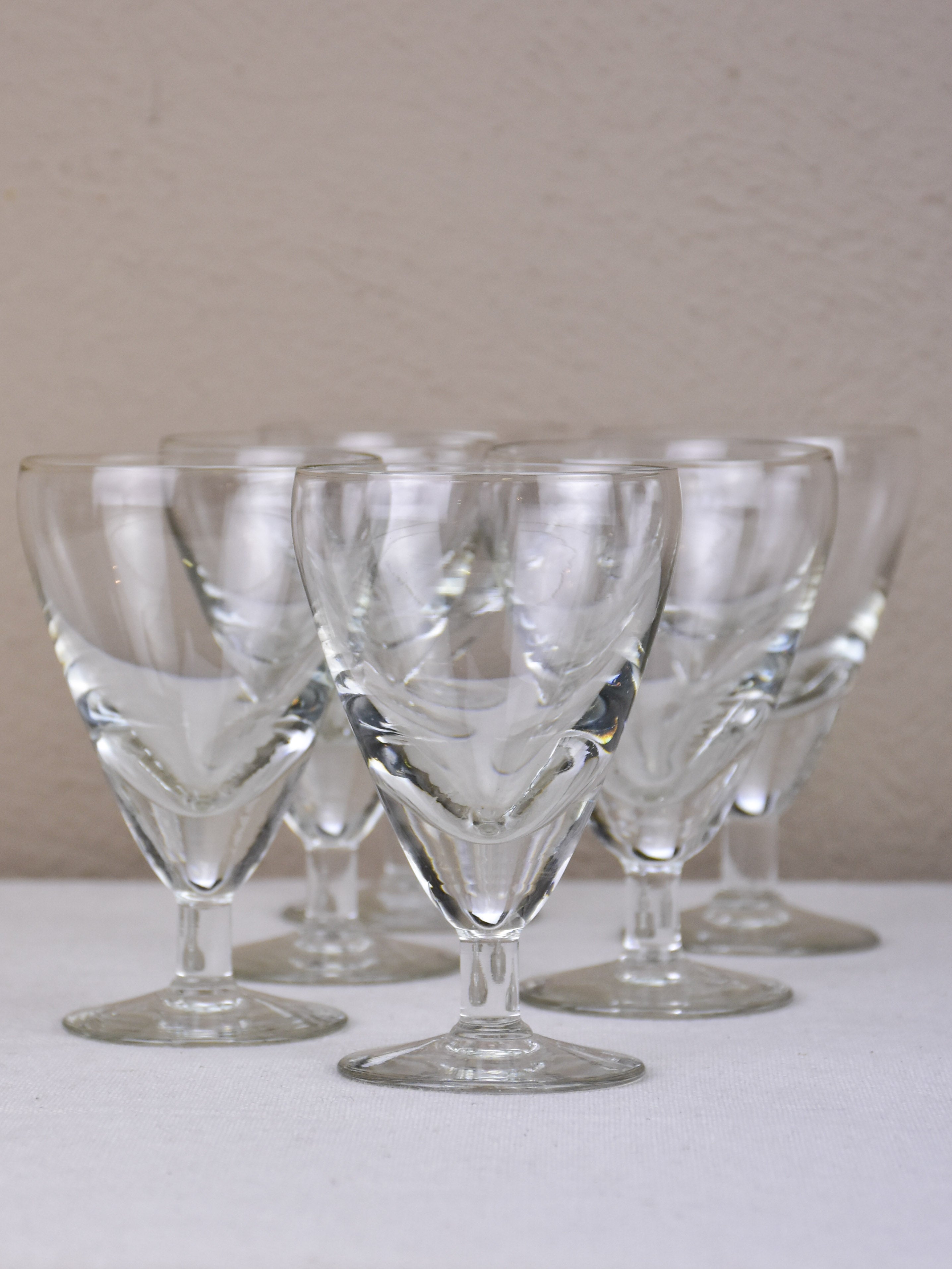 Six antique French wine glasses