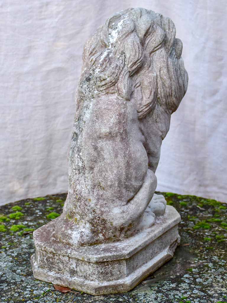 Pair of mid-century reconstituted stone lion garden sculptures