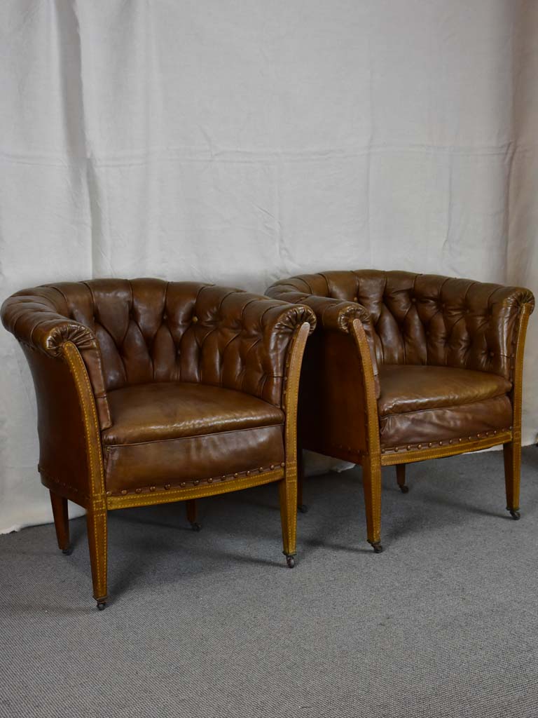 Pair of mid-century English leather armchairs