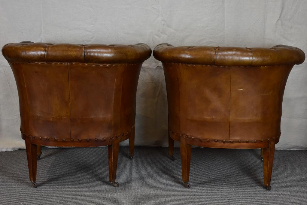 Pair of mid-century English leather armchairs